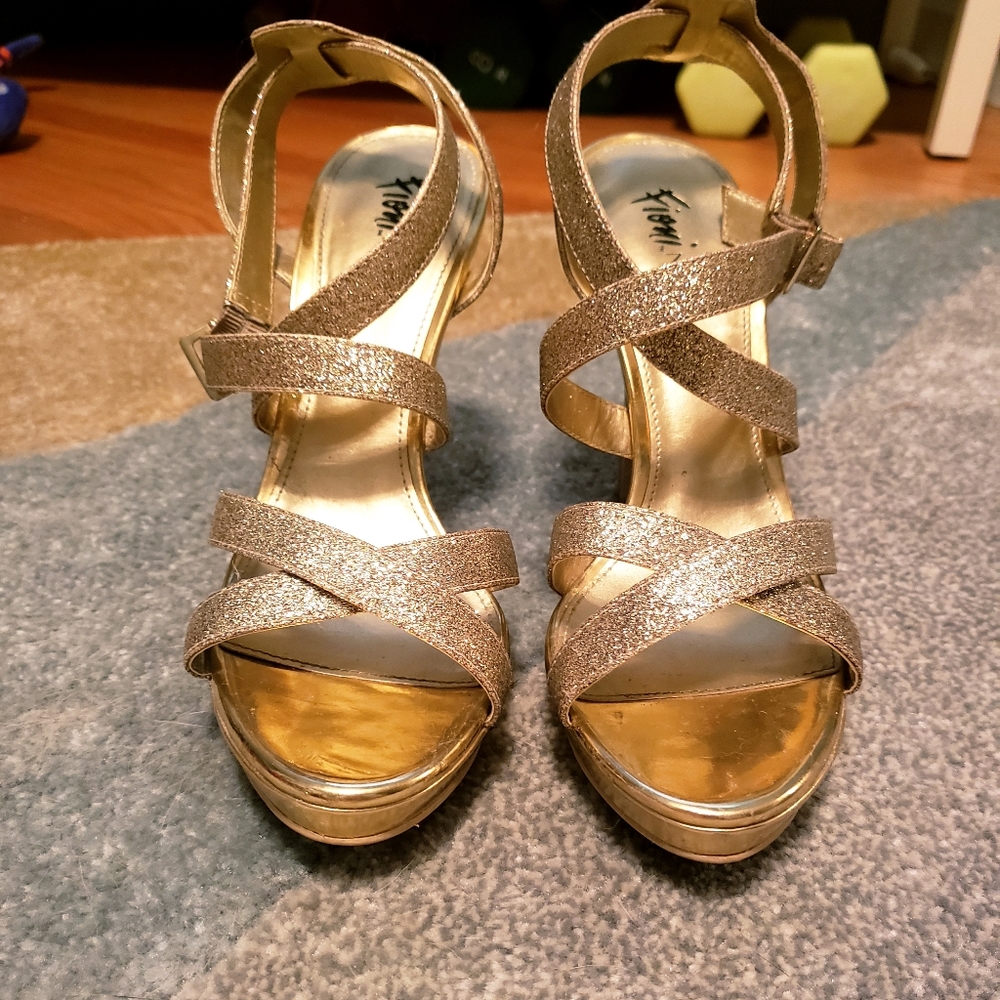 Gold high heels